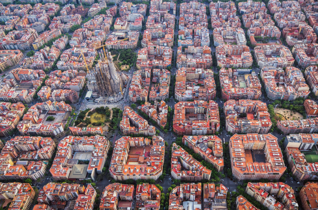Aerial View Of Barcelona Eixample Residential District And Sagra